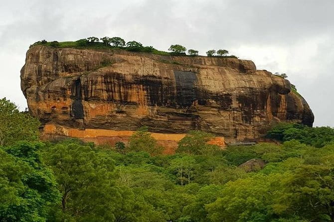 Discover Sigiriya Dambulla and Minneriya Park in Day Tour - Dambulla Cave Temple: five cave shrines and 150+ Buddhas