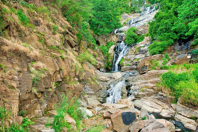 Sri Lanka tour 8 Days with a private driver, hotels, and vehicle - Dambulla Cave Temple: murals, Buddha statues, and UNESCO scale